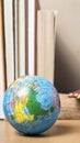 Book and earth ball with color pencil Royalty Free Stock Photo