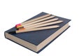 Book and five pencils. Royalty Free Stock Photo