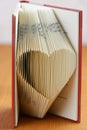 Book folding heart Royalty Free Stock Photo