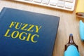 Book about fuzzy logic on a table. Royalty Free Stock Photo