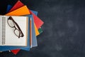 Book glasses and pencil on the desk