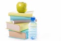 Book,green apple and water Royalty Free Stock Photo