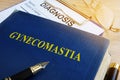 Book about Gynecomastia on a table. Royalty Free Stock Photo