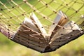 Book in a hammock nobody Royalty Free Stock Photo