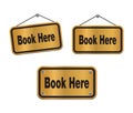 Book here - bronze signs Royalty Free Stock Photo