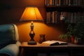 Book beside lamp cozy ambiance, perfect for evening reading