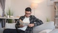 Book leisure home smart man reading couch glasses Royalty Free Stock Photo