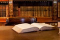Book on library table Royalty Free Stock Photo