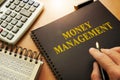 Book with money management. Royalty Free Stock Photo