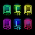 Book neon icons. Textbook silhouette in bright colors. Glowing neon book sign. Set of vector icons Royalty Free Stock Photo