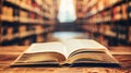 A book is open on a table with a library background Royalty Free Stock Photo