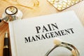 Book about Pain management. Chronic care management. Royalty Free Stock Photo