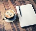 Book, pencil, coffee cup