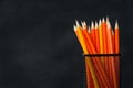 book and pencil on white table black board background Royalty Free Stock Photo