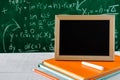 book and pencil on white table black board background with study Royalty Free Stock Photo