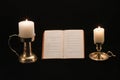 Book of poems and candles Royalty Free Stock Photo