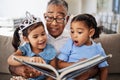 Book, reading and grandfather with wow, children and learning story, language development and education on living room Royalty Free Stock Photo