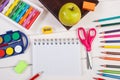 Book and school accessories on white boards, back to school concept Royalty Free Stock Photo