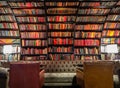 Book shelf wall design shelves library books couch living room home decoration design seat warm interior