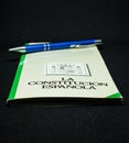 Book of the spanish constitution wiht a pen and the graphical white background Royalty Free Stock Photo