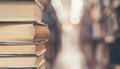 Book stack in library study room with bookshelf for business and education background, class learning and back to school concept