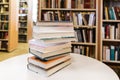 Book Stack On White Desk In The Library Room