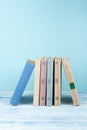 Book stacking, hardback books on wooden table. Back to school. Copy space for text