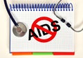 Book with stop aids symbol