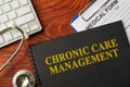 Book with title chronic care management on a table. Royalty Free Stock Photo