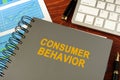 Book with title consumer behavior. Royalty Free Stock Photo