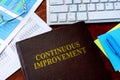 Book with title continuous improvement.