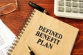 Book with title Defined Benefit Plan. Royalty Free Stock Photo