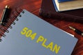 Book with title 504 plan. Royalty Free Stock Photo