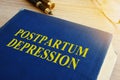 Book with title Postpartum depression. Royalty Free Stock Photo