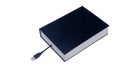 a book with a USB plug coming out of its pages Royalty Free Stock Photo