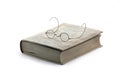 Book and vintage glasses