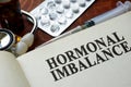 Book with words hormonal imbalance