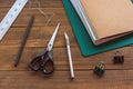 Bookbinding tools on wooden table