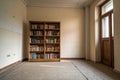 Bookcase in empty room Royalty Free Stock Photo