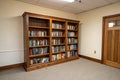 Bookcase in an empty room Royalty Free Stock Photo