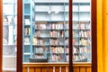 Bookcase racks in the public night library interior knowledge university Royalty Free Stock Photo
