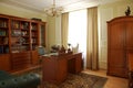 Bookcase, table and chair Royalty Free Stock Photo