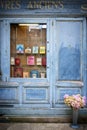 SAINT-MALO, FRANCE. Bookcase with wooden facade of ancient books with a retro charm.