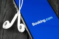 Booking.com application icon on Apple iPhone X screen close-up. Booking app icon. Booking.com. Social media app. Social network Royalty Free Stock Photo