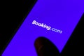 Booking.com logo displayed on the smartphone Royalty Free Stock Photo