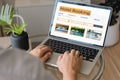 booking online concept, person using laptop computer planning travel search hotel booking