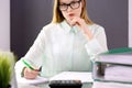 Bookkeeper or financial inspector making report, calculating or checking balance. Audit and tax service concept. Gree Royalty Free Stock Photo