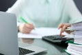 Bookkeeper or financial inspector making report, calculating or checking balance. Binders with papers closeup. Audit an Royalty Free Stock Photo