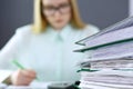 Bookkeeper or financial inspector making report, calculating or checking balance. Binders with papers closeup. Audit an Royalty Free Stock Photo