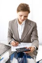 Bookkeeper woman or financial inspector making report, calculating or checking balance. Business portrait. Copy spac